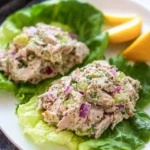 Keto Tuna Salad: The Ultimate Low-Carb Lunch Packed with Flavor 6 Classic keto tuna salad with red onion and celery on romaine lettuce cups